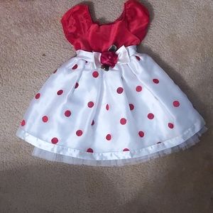 Girl's red and cream polka dot dress